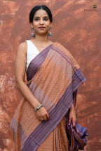 Lekhika Sambalpuri cotton saree pallu detail — geometric ikat check pattern in light brown and navy blue, Pasapali