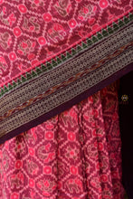 Load image into Gallery viewer, Ikat border motif close-up — Lilavati pink Sambalpuri Bandha saree, Bhulia weavers, Pasapali
