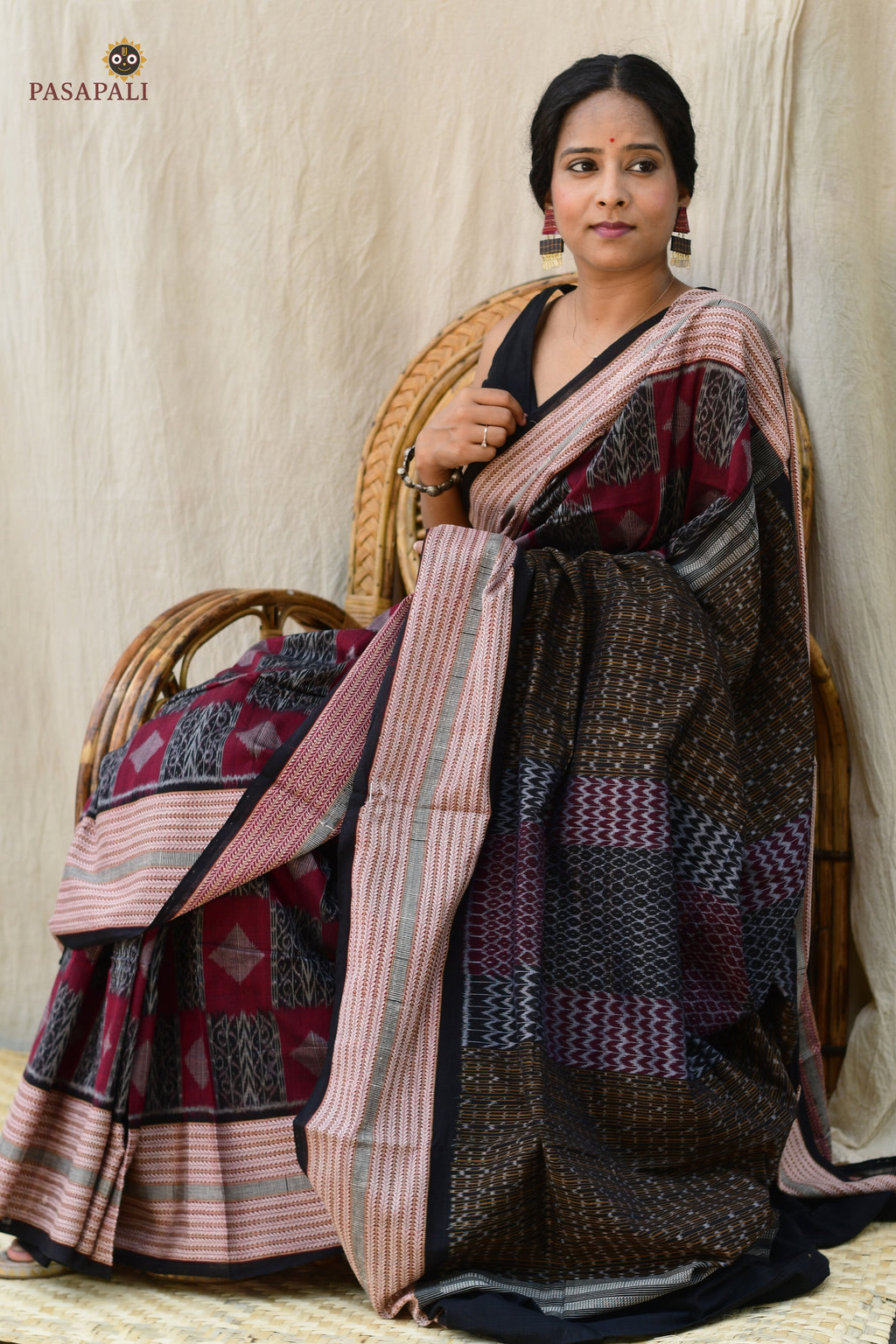 Lopamudra — flat lay of maroon black Sambalpuri Bandha mercerized cotton saree with blouse, Pasapali