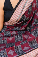 Lopamudra — draped front view of maroon Sambalpuri cotton saree with chevron border and ikat pallu, Pasapali
