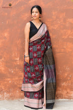 Lopamudra — pallu detail showing geometric ikat double ikat patterns on maroon Sambalpuri cotton saree, Pasapali