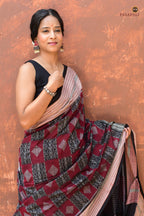 Lopamudra — woven texture detail of Bandha double ikat on maroon mercerized cotton Sambalpuri saree, Pasapali