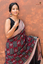 Load image into Gallery viewer, Lopamudra — woven texture detail of Bandha double ikat on maroon mercerized cotton Sambalpuri saree, Pasapali
