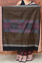 Lopamudra — folded saree showing maroon and black palette of Sambalpuri Bandha cotton saree by Pasapali