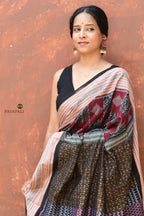 Lopamudra — ikat motif detail of geometric buta patterns on maroon Sambalpuri handloom saree, Pasapali
