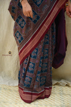 Load image into Gallery viewer, Madhavi Brown Sambalpuri Bandha mercerized cotton saree from Pasapali — hero full view with Phula Lata body and Rudraksha border
