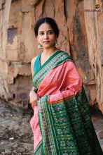 Load image into Gallery viewer, Madhujaal Sambalpuri Bandha saree border close-up — fish motif in green on peach mercerized cotton | Pasapali
