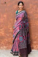 Load image into Gallery viewer, Maitreyi Sambalpuri Bandha saree folded flat — pink body, brown border, phula chakra pallu end visible | Pasapali
