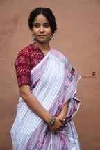 Ikat motif detail on Malini Sambalpuri cotton saree — elephant and deer figures woven by Bhulia weavers, Odisha