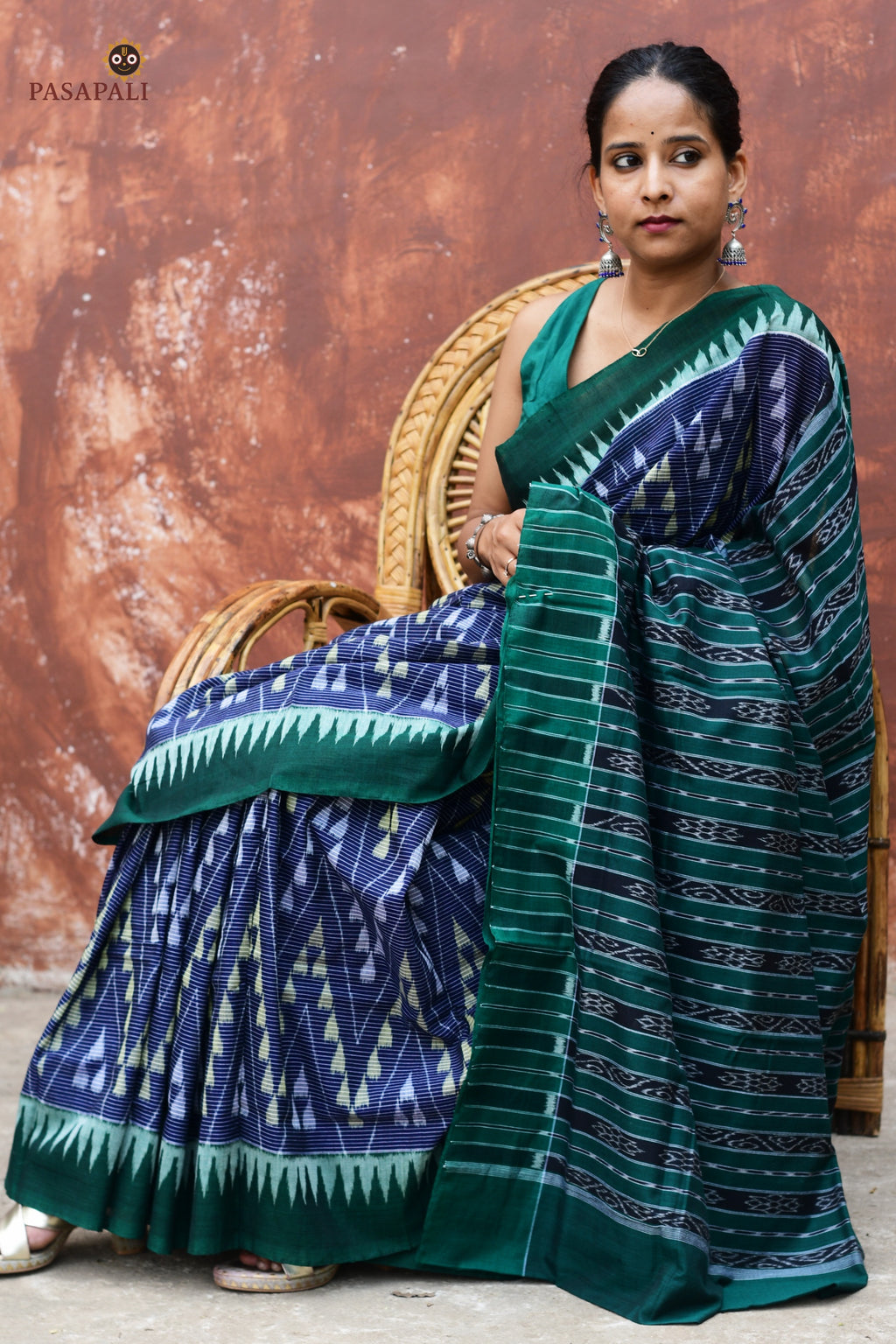 Mandakranta blue Sambalpuri Bandha mercerized cotton saree by Pasapali — full hero view with chevron body and green border