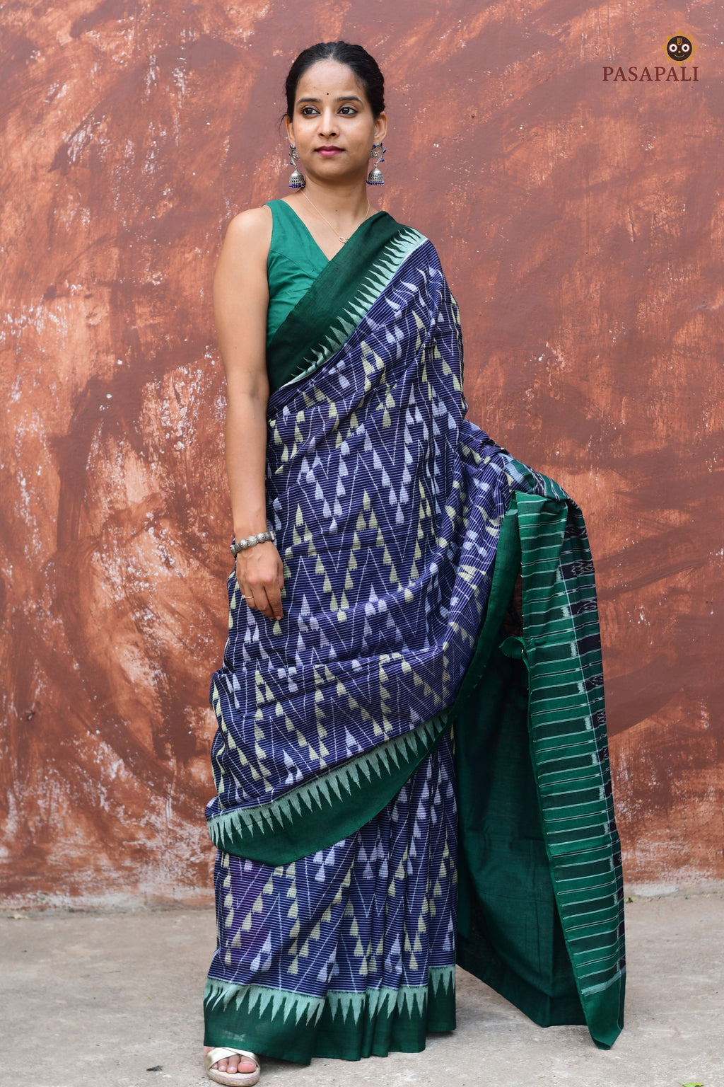 Mandakranta Sambalpuri cotton saree front drape — blue with green kumbha border and double ikat chevron motifs by Pasapali