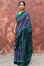 Handloom drape view of Mandakranta Sambalpuri Bandha saree in blue and green mercerized cotton by Pasapali