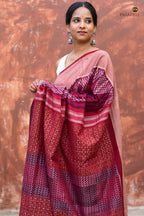 Mandira Sambalpuri Bandha saree — draped front detail showing geometric ikat kumbha in burgundy mercerized cotton | Pasapali