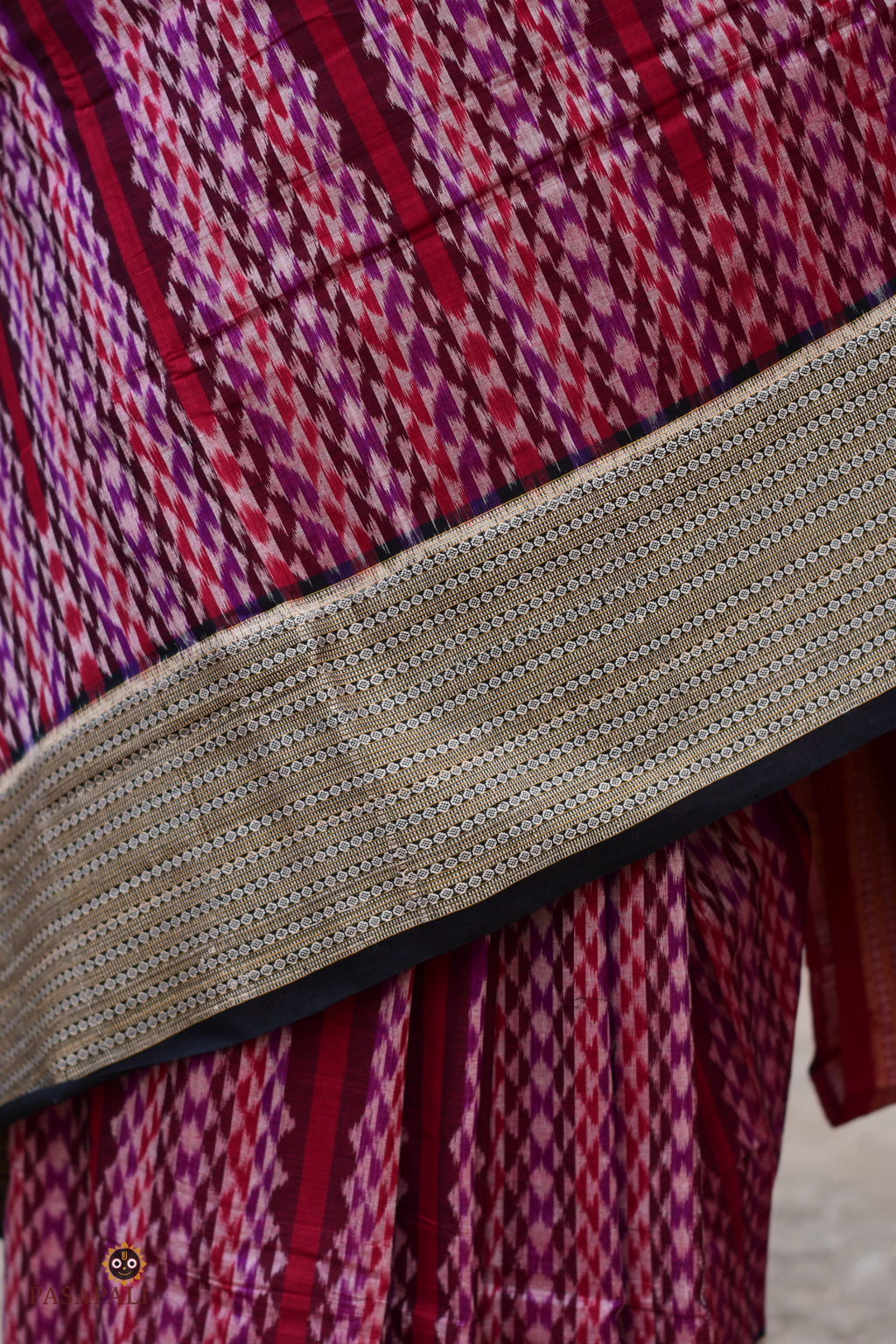 Mandira mercerized cotton Sambalpuri saree — fabric surface detail showing Bandhakala resist-dye thread structure | Pasapali