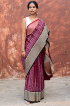 Mandira burgundy Sambalpuri handloom saree — folded view displaying Ganga Jamuna border and ikat pallu | Pasapali
