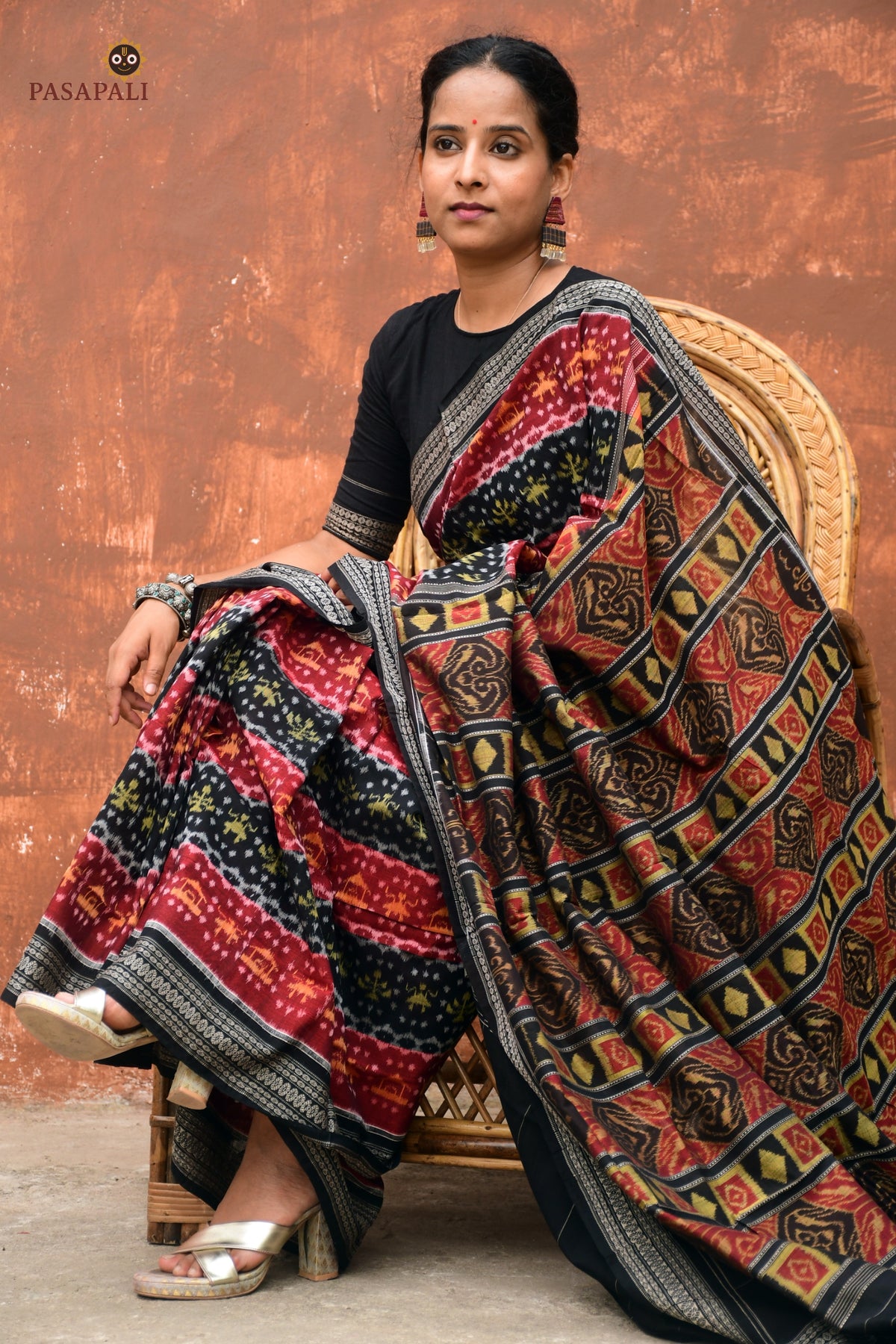 Matangi — folded view of maroon and black Sambalpuri Bandha mercerized cotton saree with Rudraksha border by Pasapali