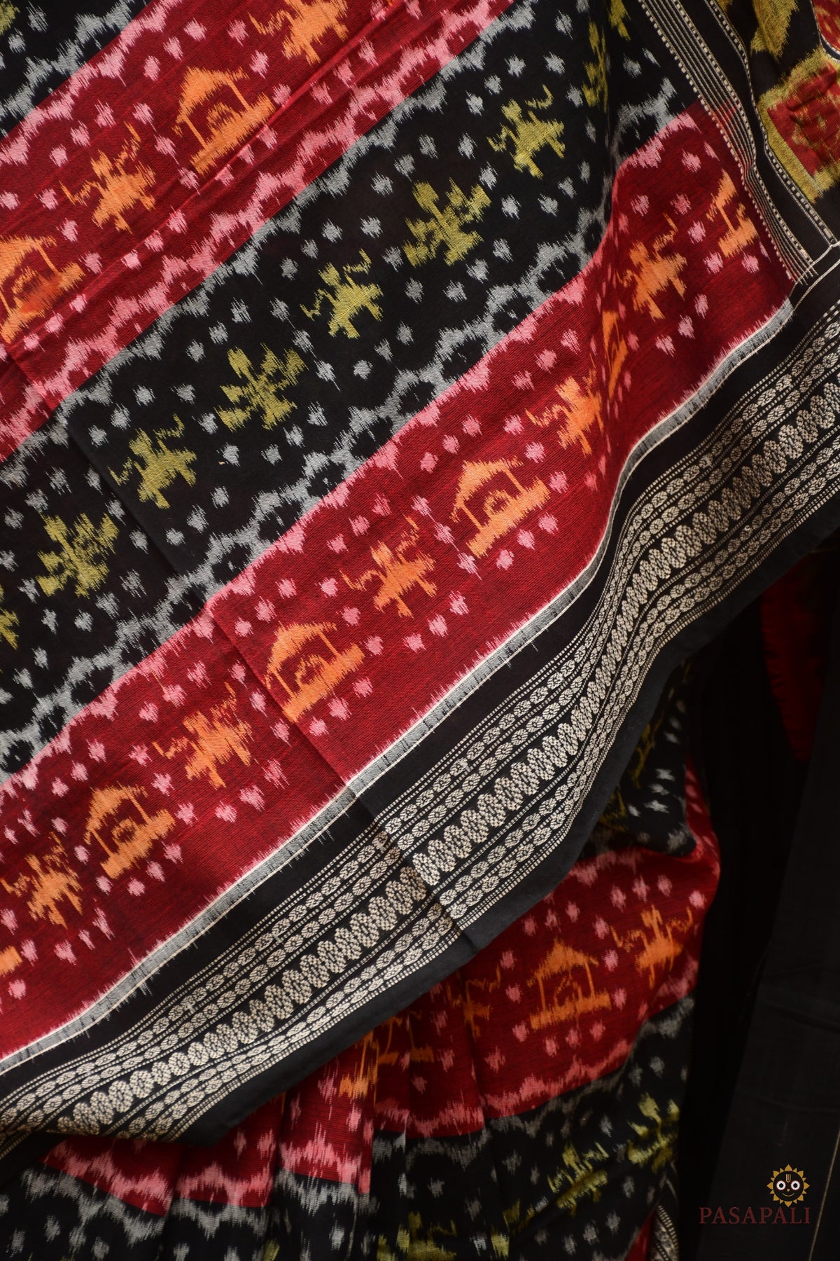 Matangi — Rudraksha and flower motif detail on maroon Sambalpuri Bandha double ikat cotton saree by Pasapali