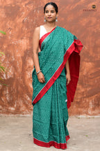Close-up of solid red border on Mrinmayee Sambalpuri Bandha mercerized cotton saree by Pasapali