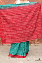 Mrinmayee green Sambalpuri cotton saree folded view — red border and Bandha ikat weave, Pasapali