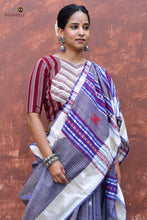 Load image into Gallery viewer, Narmada Kotpad saree handloom drape view — blue and off-white Tussar Cotton Silk, tribal fish motifs, vegetable dye tradition
