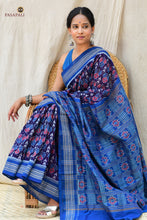 Load image into Gallery viewer, Flat lay of Neelima navy blue Sambalpuri Bandha saree showing full length with flower pallu and phula body
