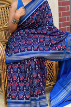 Load image into Gallery viewer, Front drape of Neelima Sambalpuri handloom saree highlighting Rudraksha motif border in navy blue and blue
