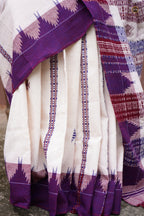 Nirjhari Kotpad saree hero view — aal bark dyed off-white cotton, macha and pharsa motifs, Mirgan weavers