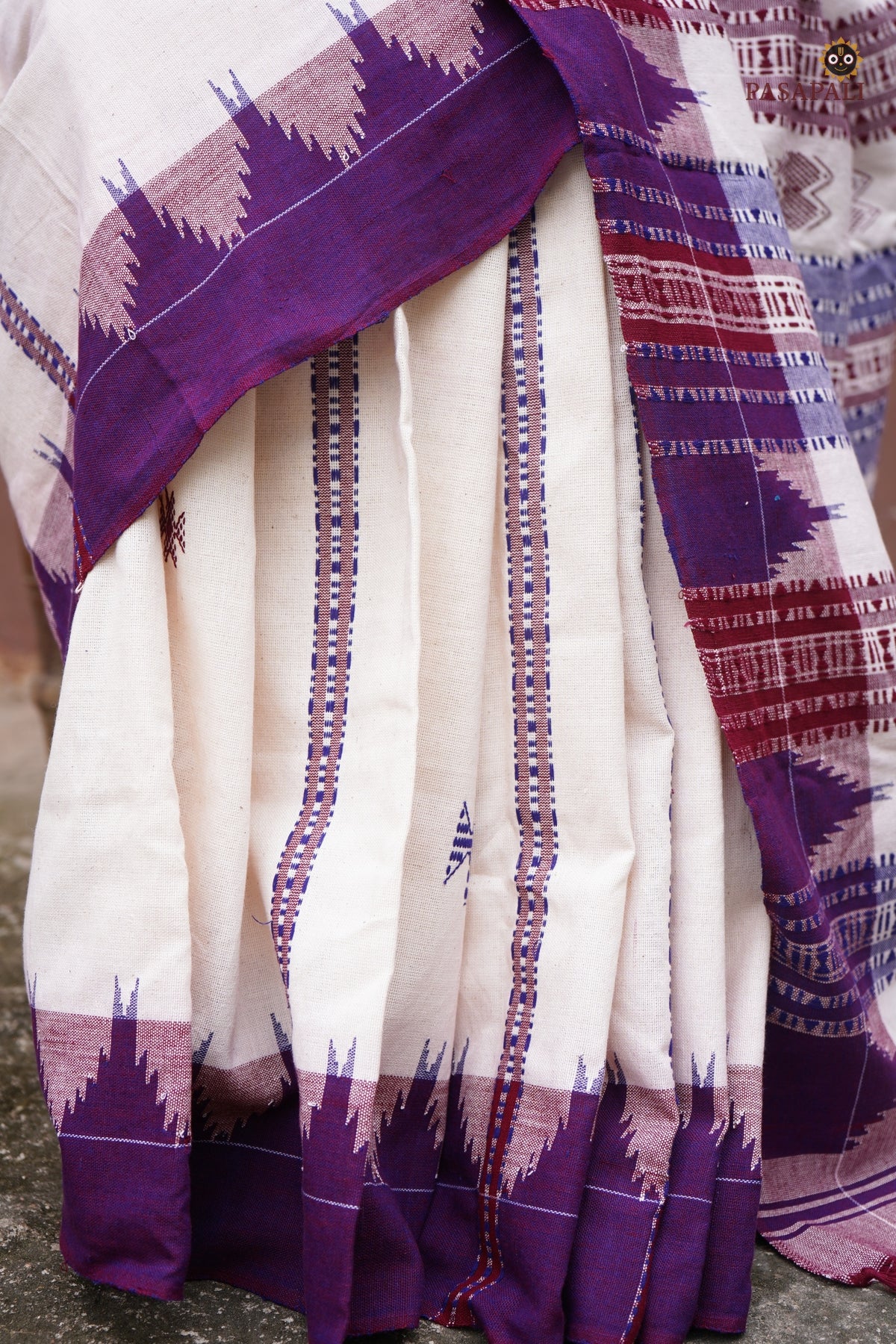 Nirjhari Kotpad saree hero view — aal bark dyed off-white cotton, macha and pharsa motifs, Mirgan weavers