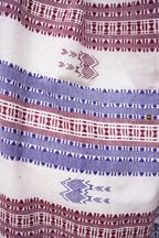 Pallu weave close-up of Nirjhari Kotpad saree — fish and axe motifs, extra-weft technique, natural dye cotton