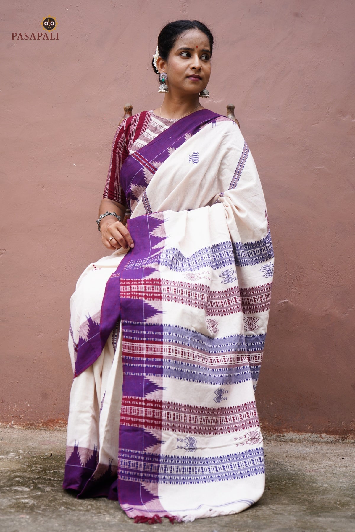 Body weave detail of Nirjhari Kotpad natural dye saree — handspun cotton, tribal motifs, Mirgan weavers Odisha
