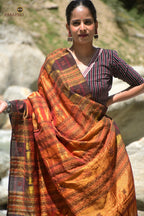Nishavana Kotpad handloom saree — hero full view highlighting phoda kumbha border and tribal buta body design