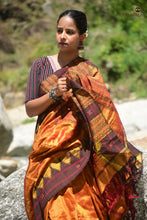 Load image into Gallery viewer, Nishavana Kotpad saree — phoda kumbha interlocking border close-up in brown and golden, Mirgan weavers Odisha

