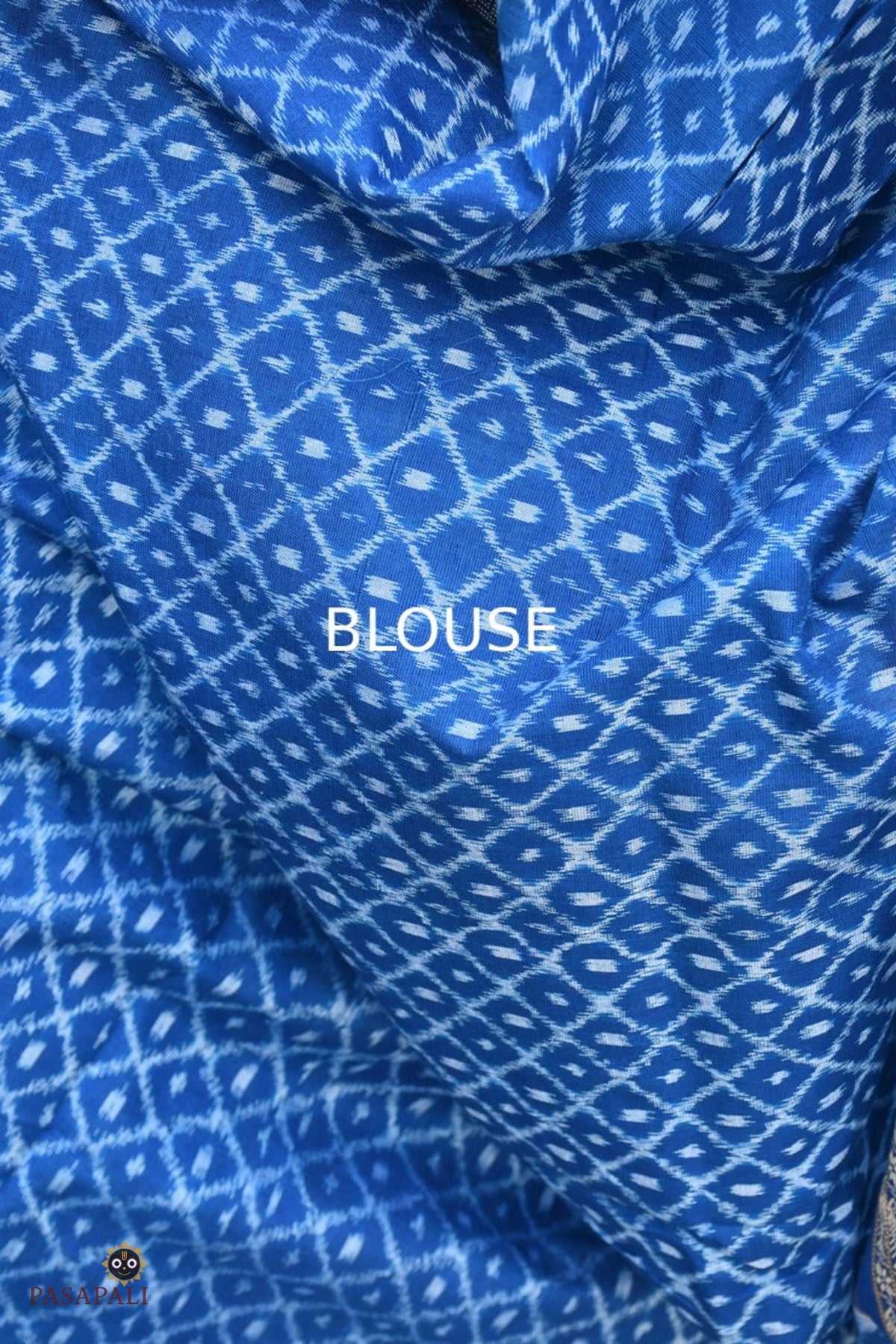 Nishigandha black Sambalpuri cotton saree by Pasapali — full hero view, Bandha double ikat, blue ikat pallu, fish border