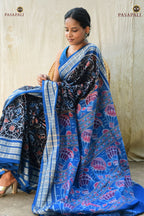 Nishigandha front drape — mercerized cotton Sambalpuri Bandha saree with birds and phula lata on black body, Pasapali