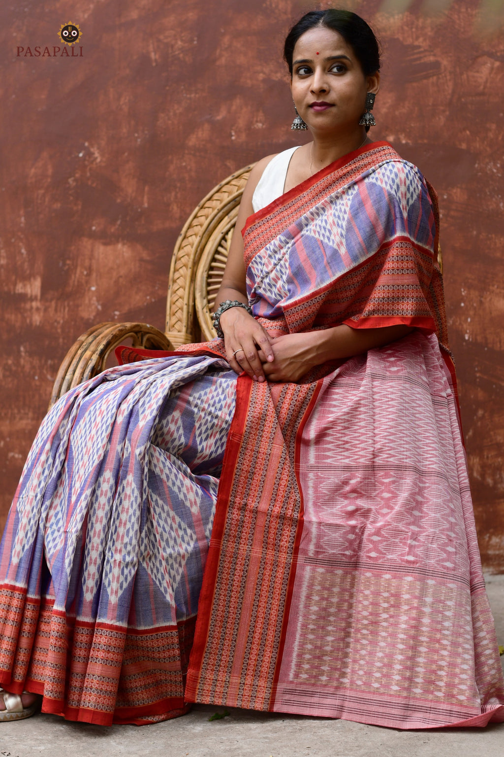 Hero view of Nityarekha GI certified Sambalpuri Bandha saree in light blue mercerized cotton — Pasapali