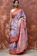 Nityarekha light blue Sambalpuri cotton saree draped front view showing rust contrast and diamond body — Pasapali