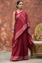Load image into Gallery viewer, Parampara — jala check weave close-up on maroon Sambalpuri handloom Bandha cotton saree Pasapali
