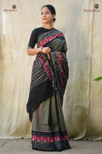 Load image into Gallery viewer, Ikat motif alignment detail on Pasarekha Grey Sambalpuri Bandha cotton saree — Bandhakala resist-dyed warp and weft
