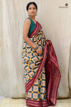 Load image into Gallery viewer, Pashika Sambalpuri Bandha saree folded detail view — cream, green and maroon Pasapali motif and Rudraksha border by Pasapali
