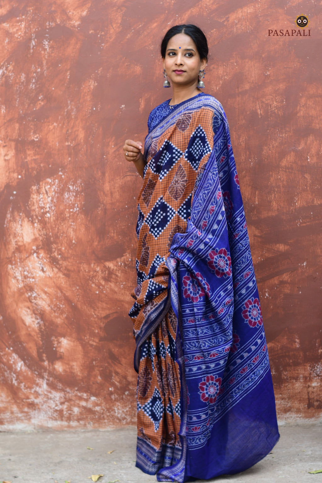 Pashini Brown Sambalpuri cotton saree draped front view showing Pasapali double ikat body and blue accents — Pasapali