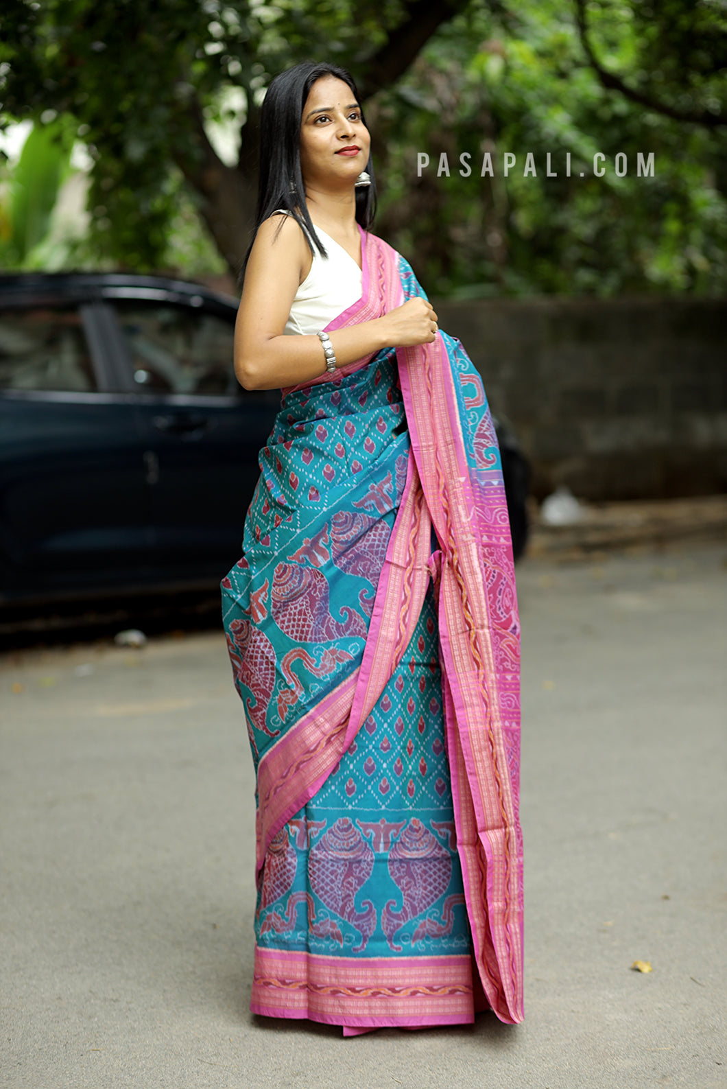 Mercerized cotton Sambalpuri saree in teal blue with pink star border and fish motifs – Pasapali