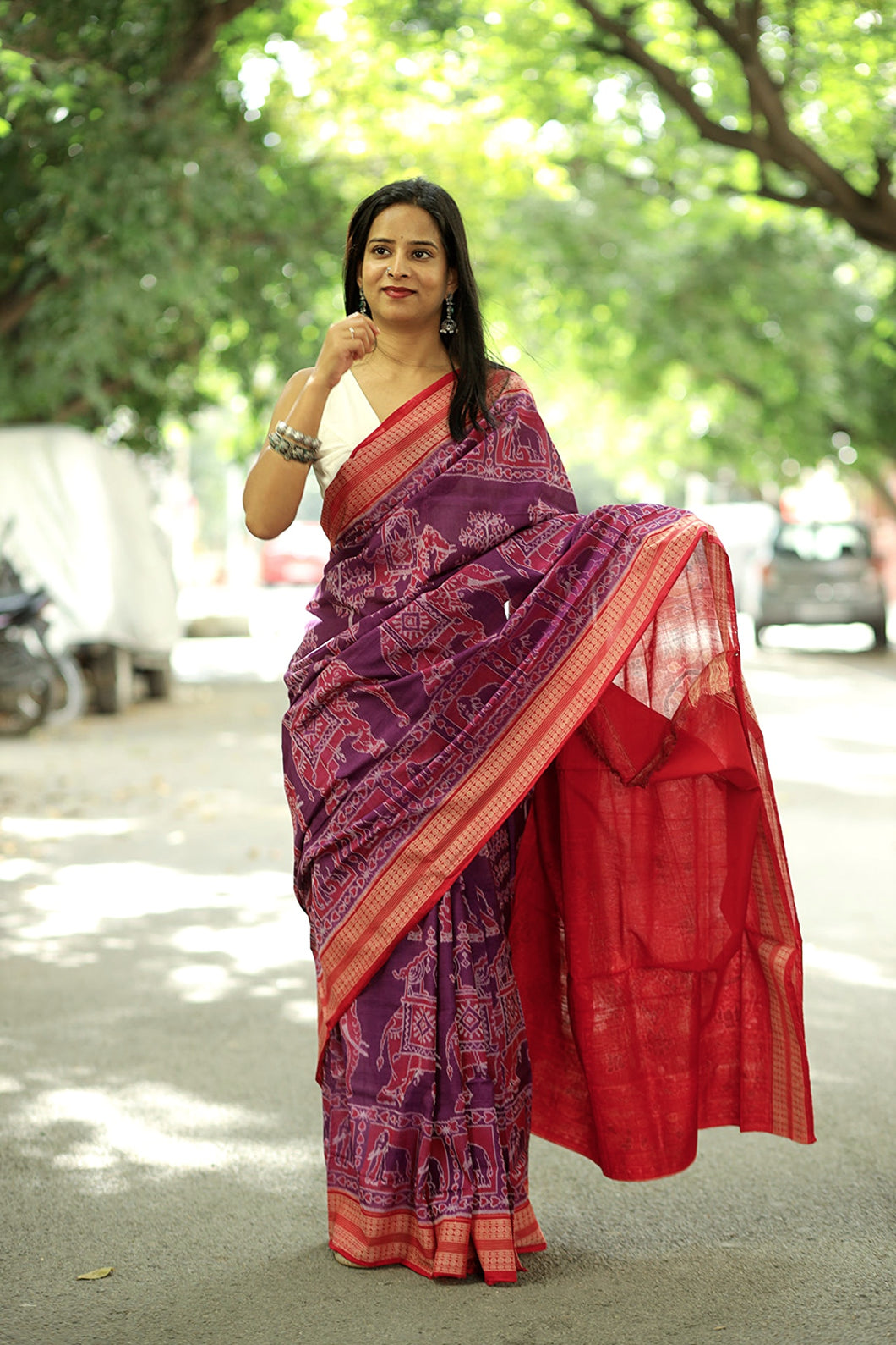 Purple Sambalpuri cotton saree with intricate elephant and tree motifs and elegant red border – Pasapali