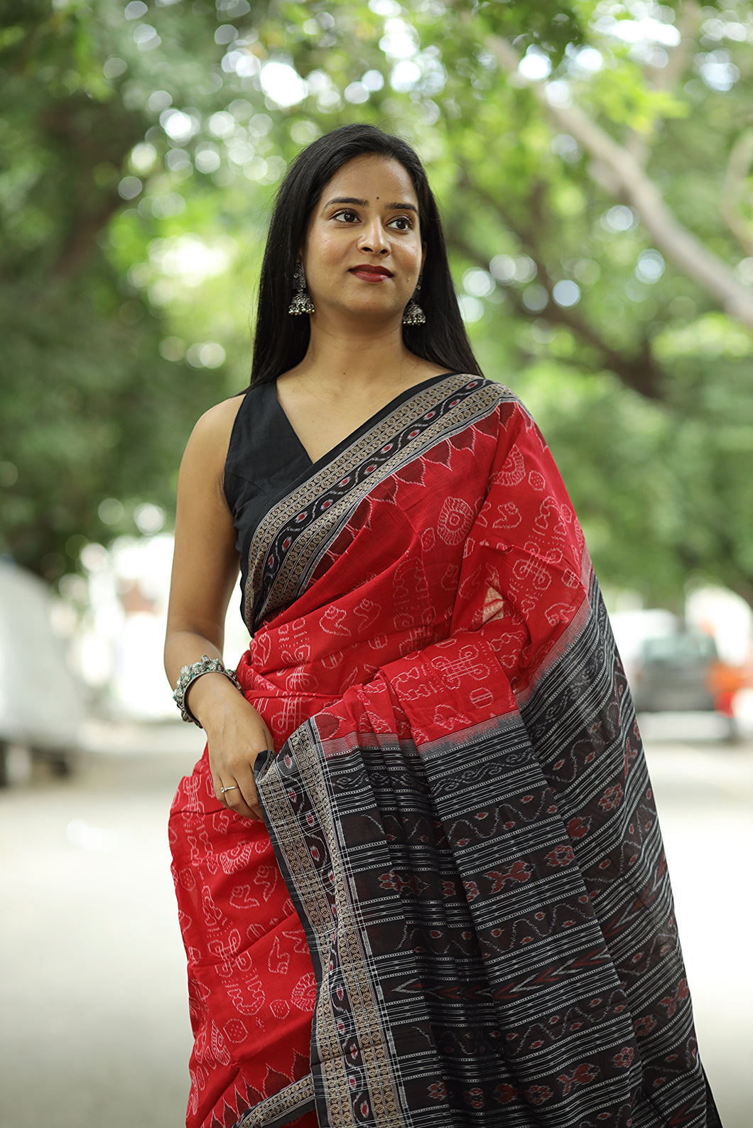 Sacred red Sambalpuri cotton saree with Laxmi Yantra motifs and Rudraksh border – Pasapali