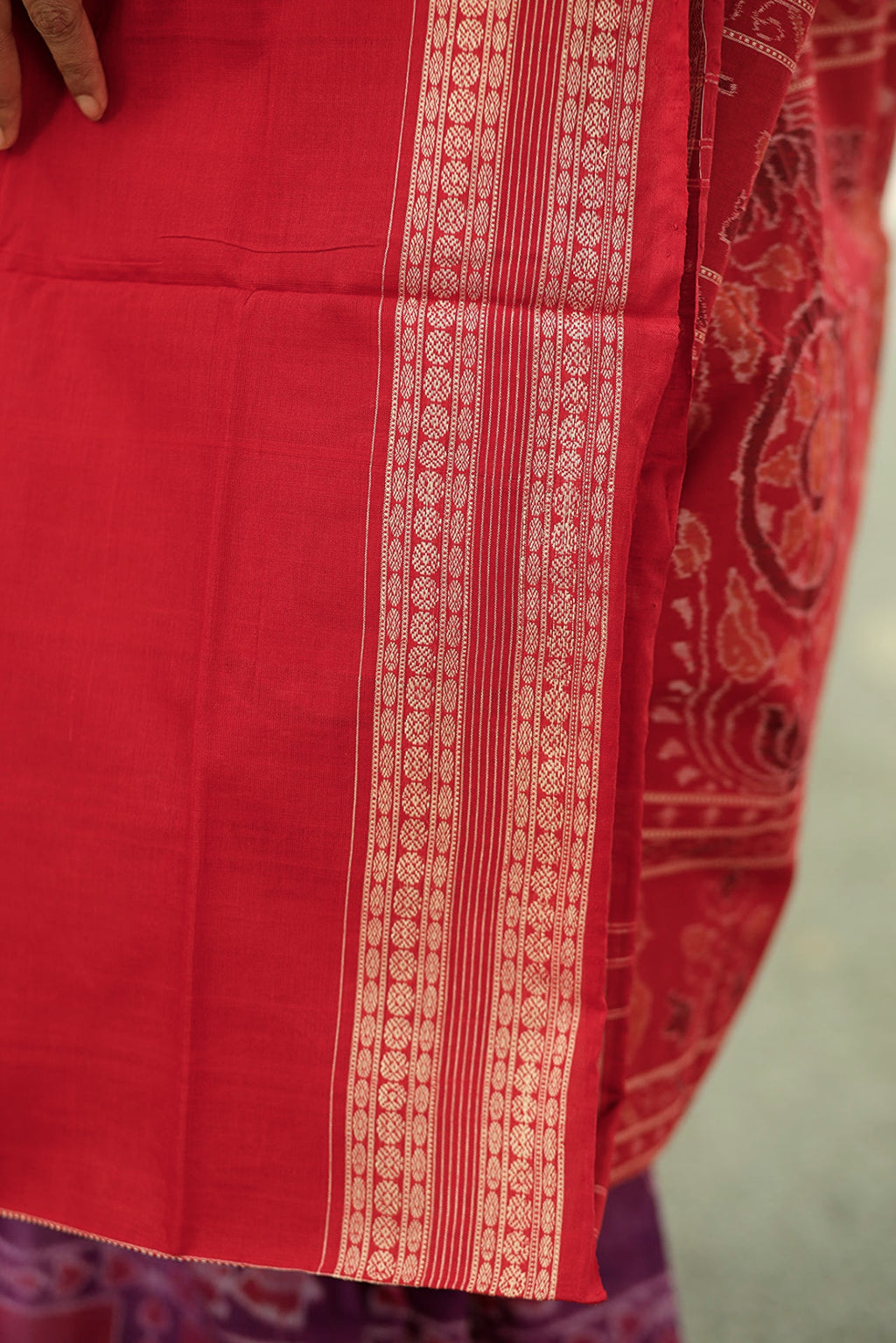 Elegant handwoven purple cotton saree with red border and intricate traditional motifs – Pasapali