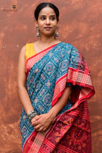 Phuljaal teal blue Sambalpuri Bandha saree — flat lay showing full length, fish border visible