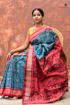 Phuljaal Sambalpuri Bandha saree — close-up of red fish motif border in teal blue, Pasapali