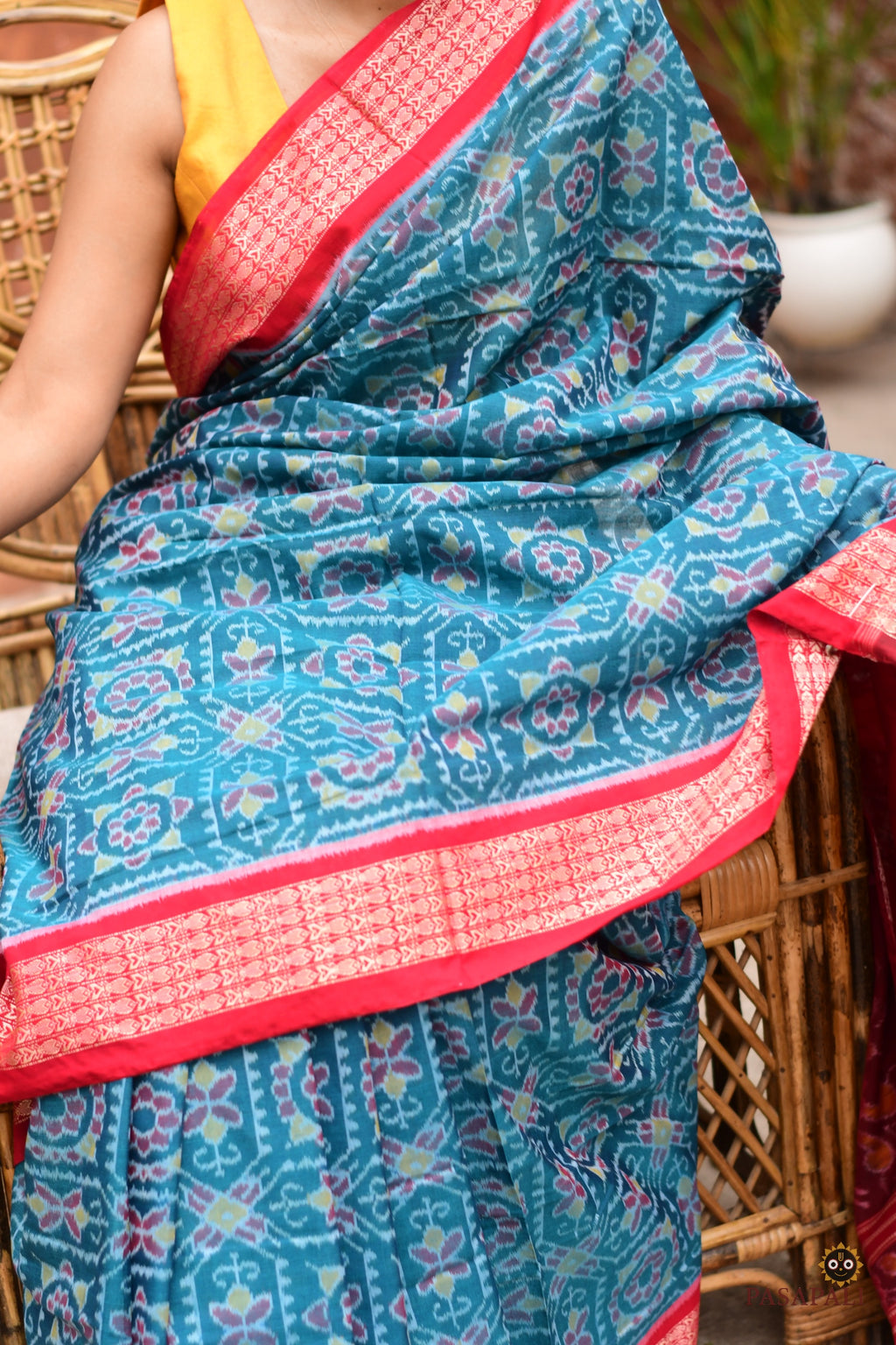 Phuljaal Sambalpuri handloom saree — mercerized cotton texture close-up, teal and red, Pasapali