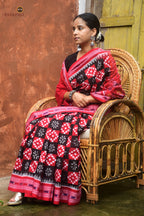 Front drape of Pramodini Red Sambalpuri cotton saree showing double ikat Pasapali body with flower buta — Pasapali