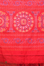 Flower buta motif detail on Pramodini Red Sambalpuri double ikat cotton saree body — Pasapali