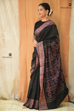 Purvasha Sambalpuri Bandha saree draped front — black jala Daanti body with ikat pallu, Pasapali Odisha